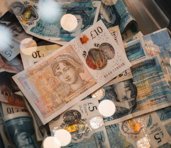 British pound notes and coins — the cash waiting when you sell your phone before values drop